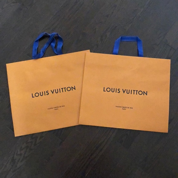 Two large Louis Vuitton shopping gift bags